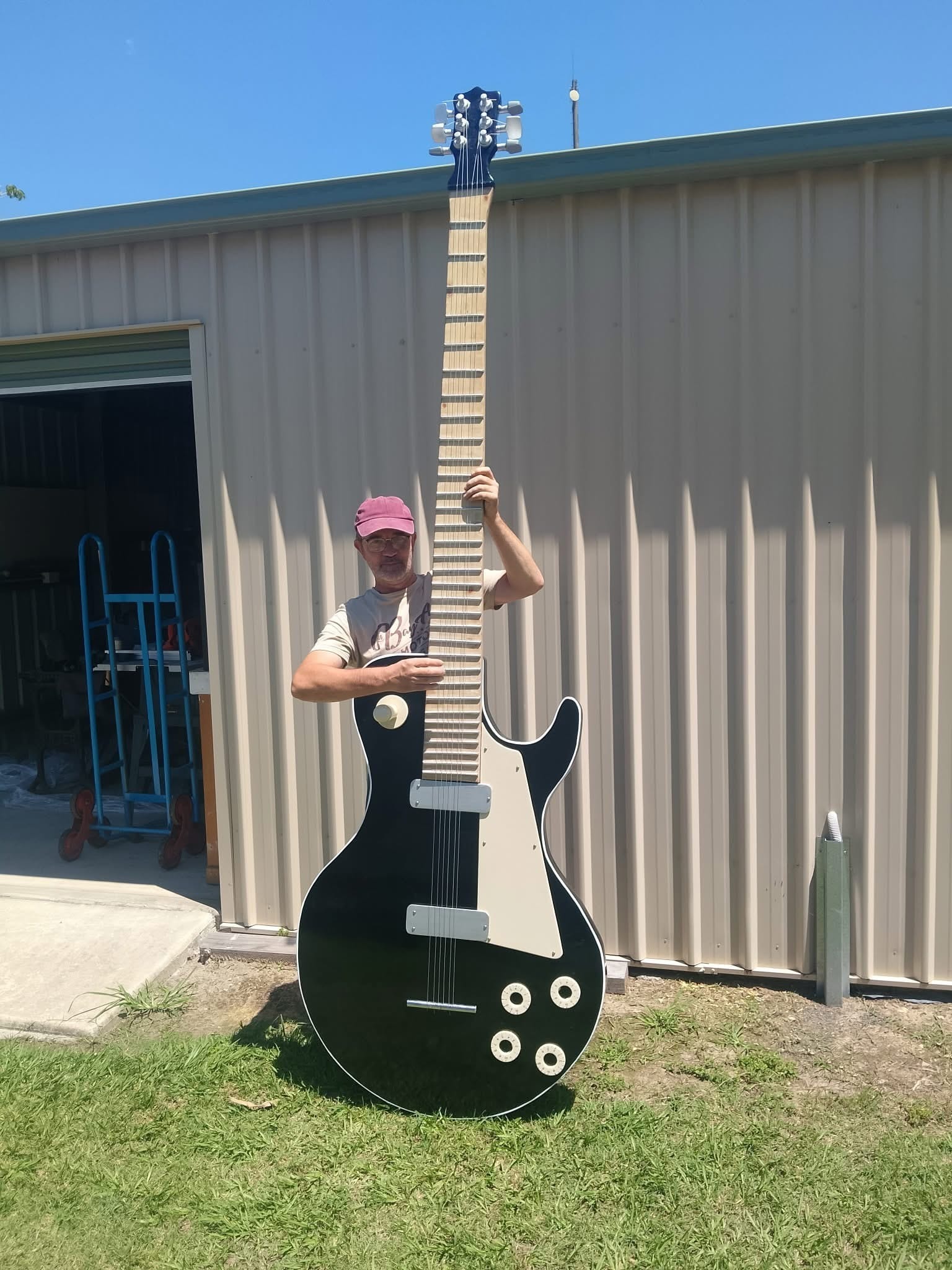 Men’s Shed builds a gigantic guitar